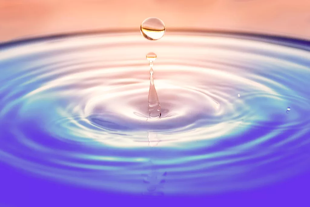 Water droplet on a colorful background