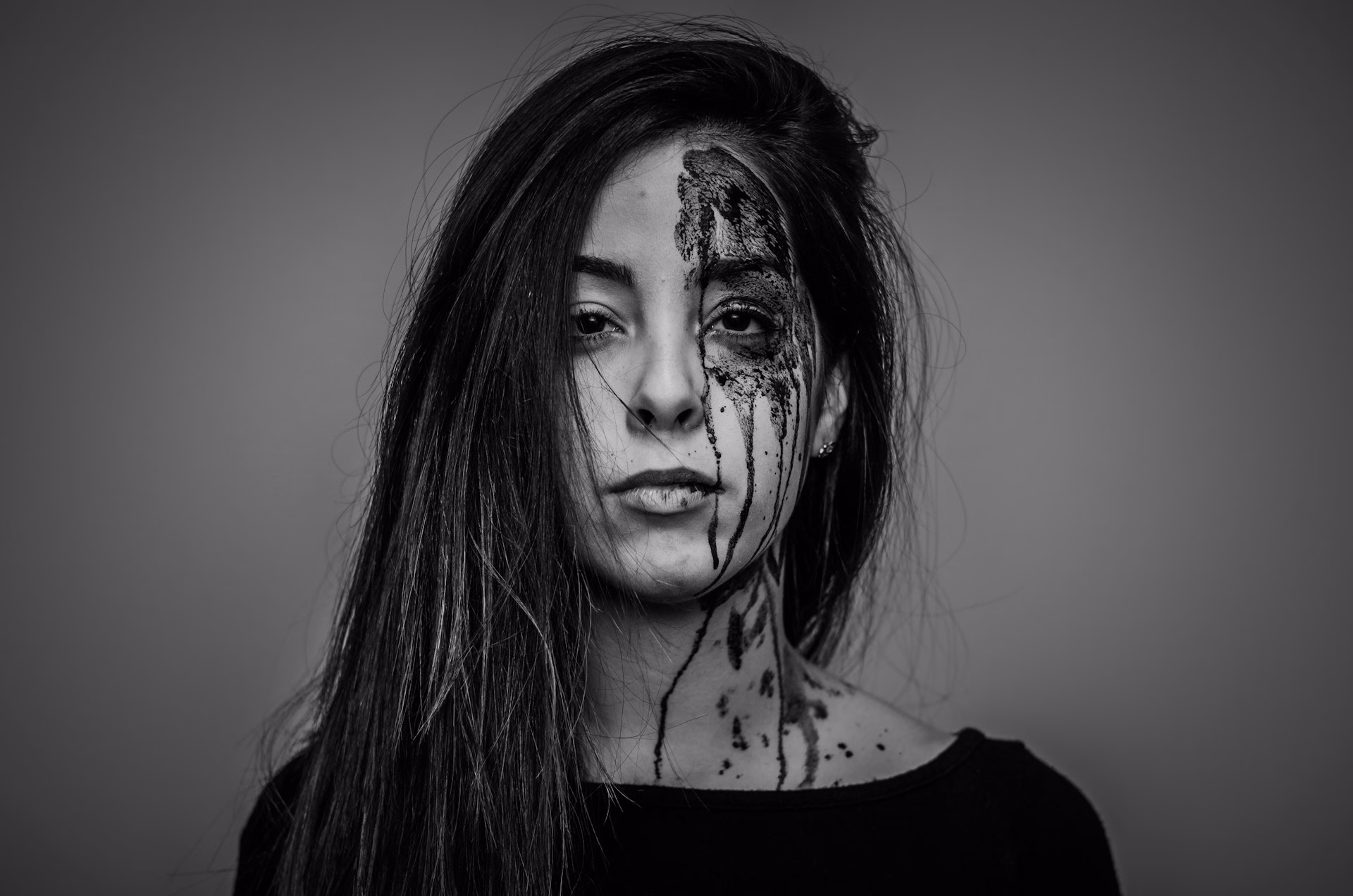A woman with a zombie like make-up